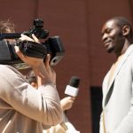 journalist-taking-interview-from-man_23-2149029311